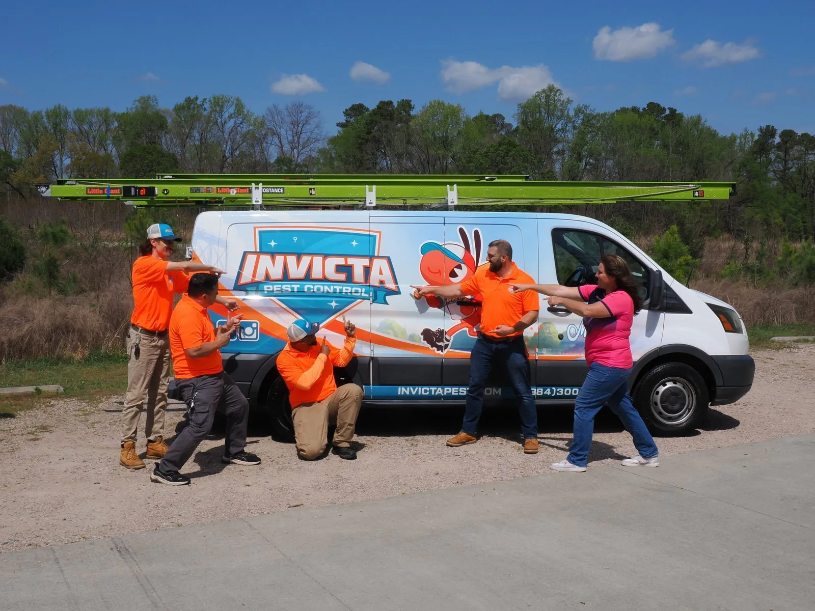 The Invicta Pest Control team posing with a van